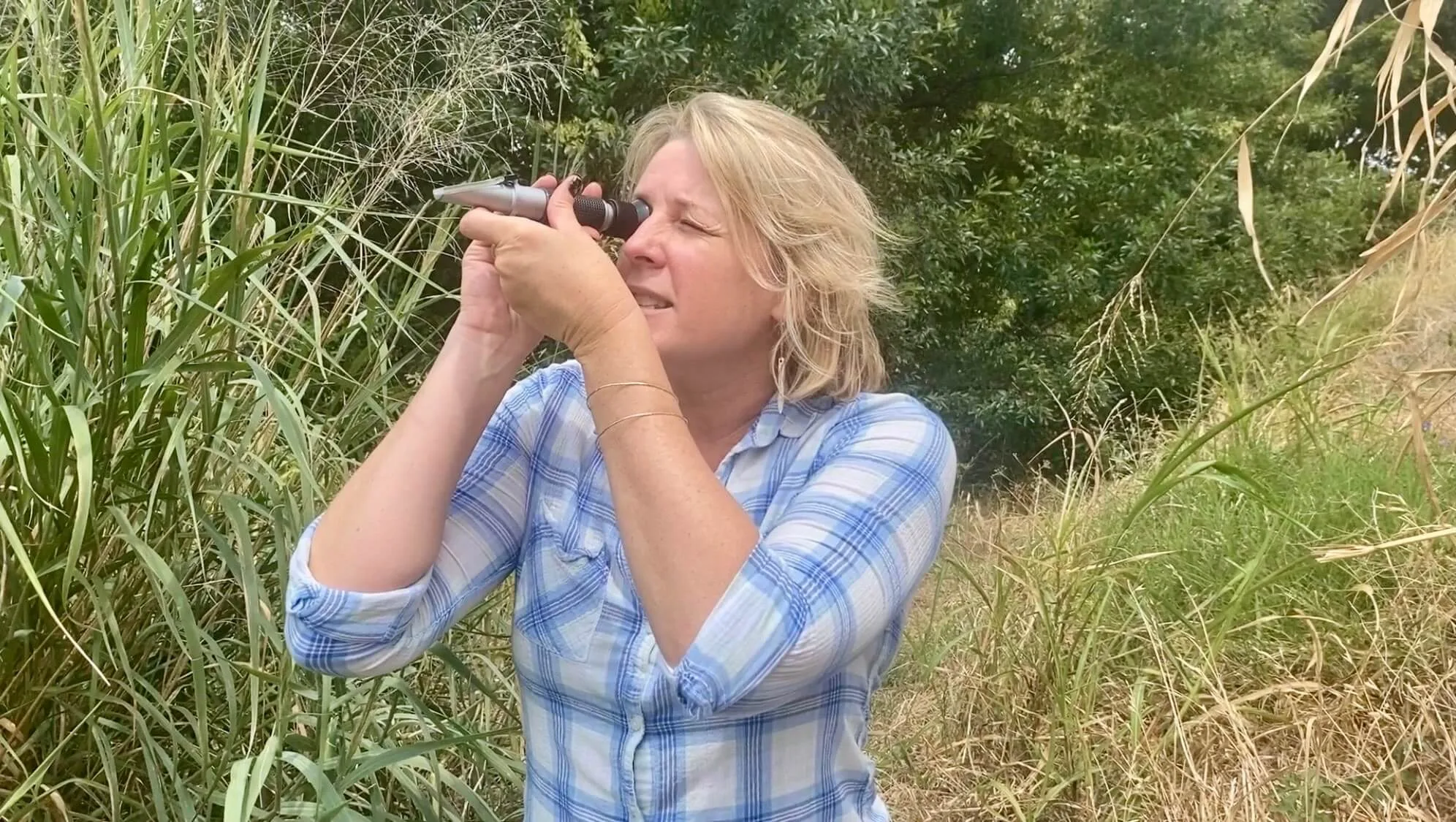 Kara using Brix Refractometer
