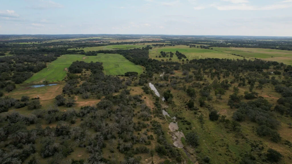 Aerial views of headwaters returning at Cave Creek on Roam Ranch 